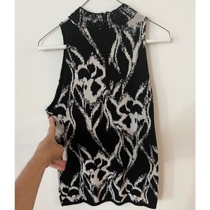 WHBM sleeveless sweater. Zip back. Embellished neck. Abstract pattern.